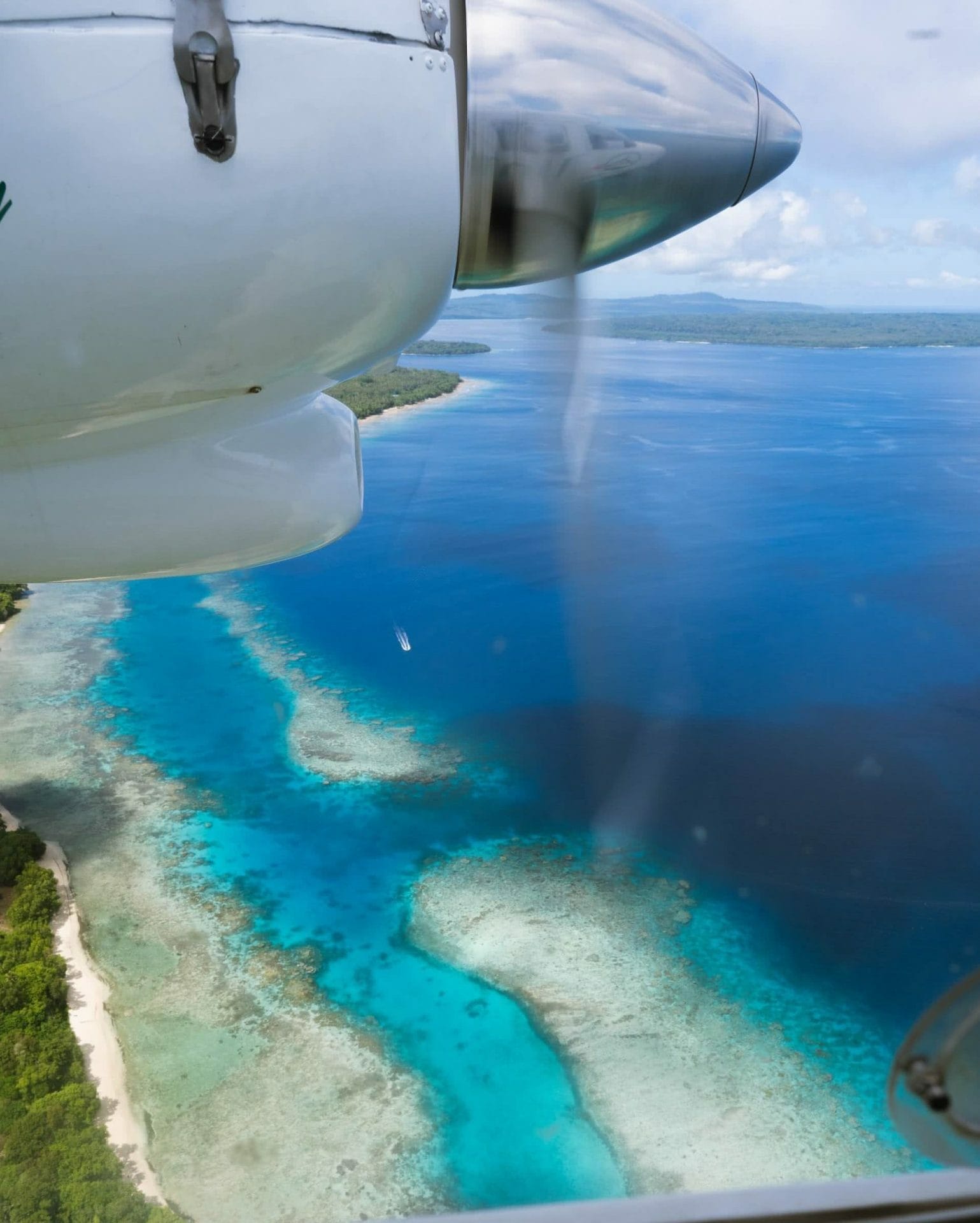 An Insider's Guide to Gaua, photos by Ben Savage and Ain Raadik, Ruby Claire, Vanuatu, island, plane view, window seat, ocean, reef, coastline