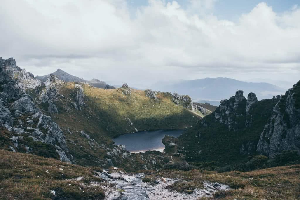 A Solo Journey Across The Western Arthurs Traverse, Christine Zelezny, Tasmania, mountains, rock, Southwest National Park, lake, forest, path