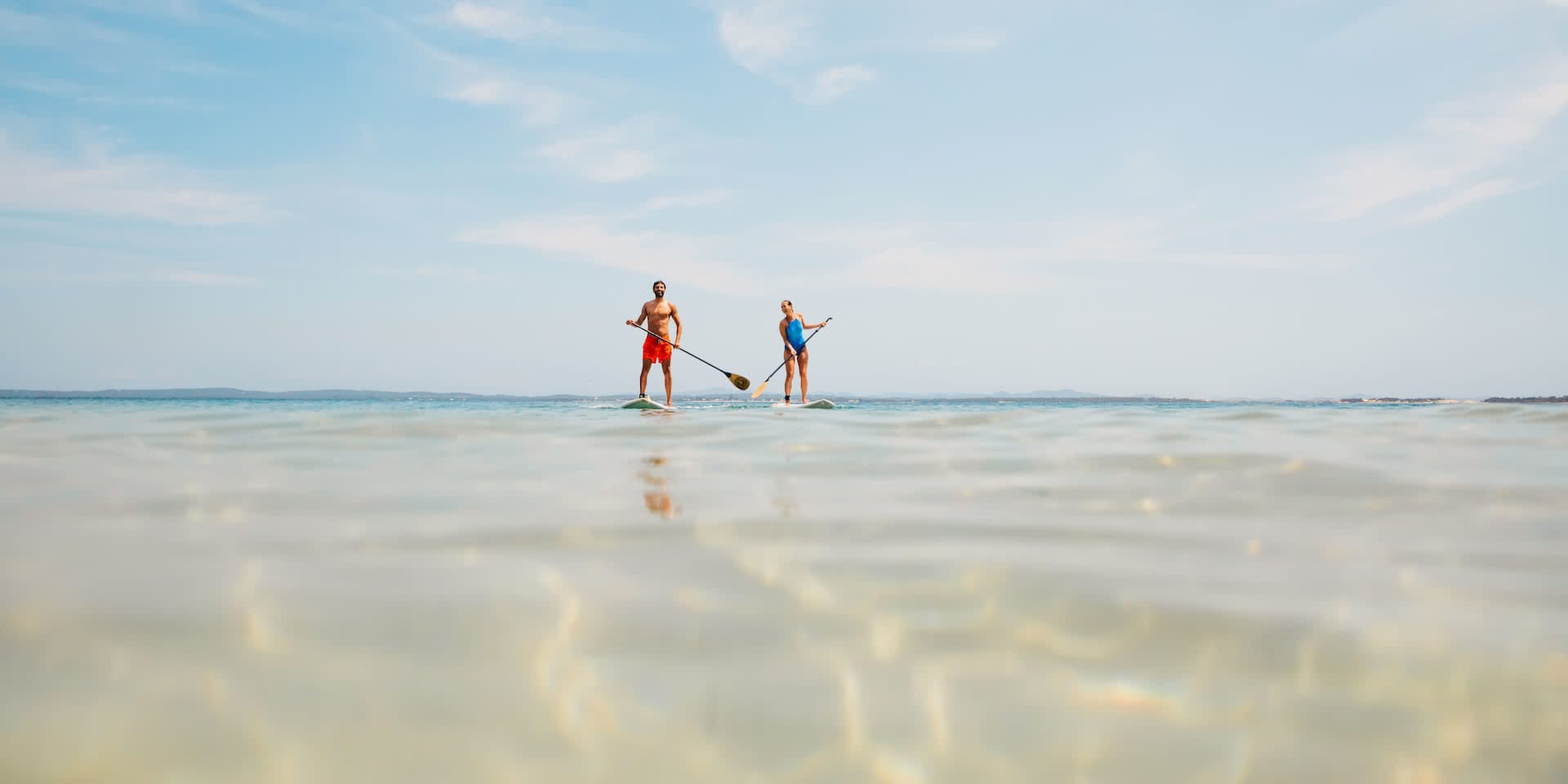 Plan Port Stephens for Your Next Adventure Weekender, photos by DNSW, SUP, people, ocean, beach, couple