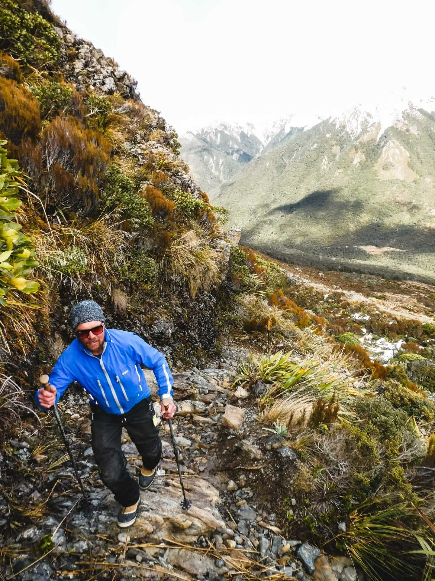 21 Laurence climbing up the access walking track to Temple Basin ski area, 24 Incredible Ski Fields & Resorts in New Zealand, Huw Kingston, New Zealand