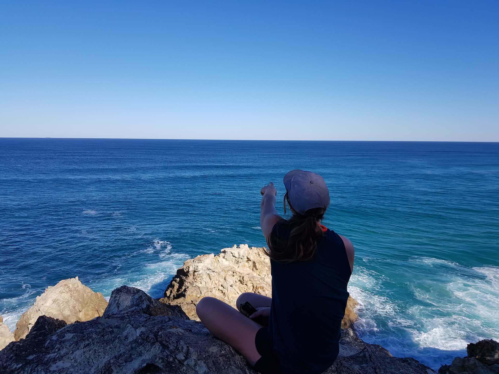 North Stradbroke Island is the Ultimate Brisbane Bikepacking Trip, Myrthe Braam, Point Lookout, woman, ocean, whale watching, cliff