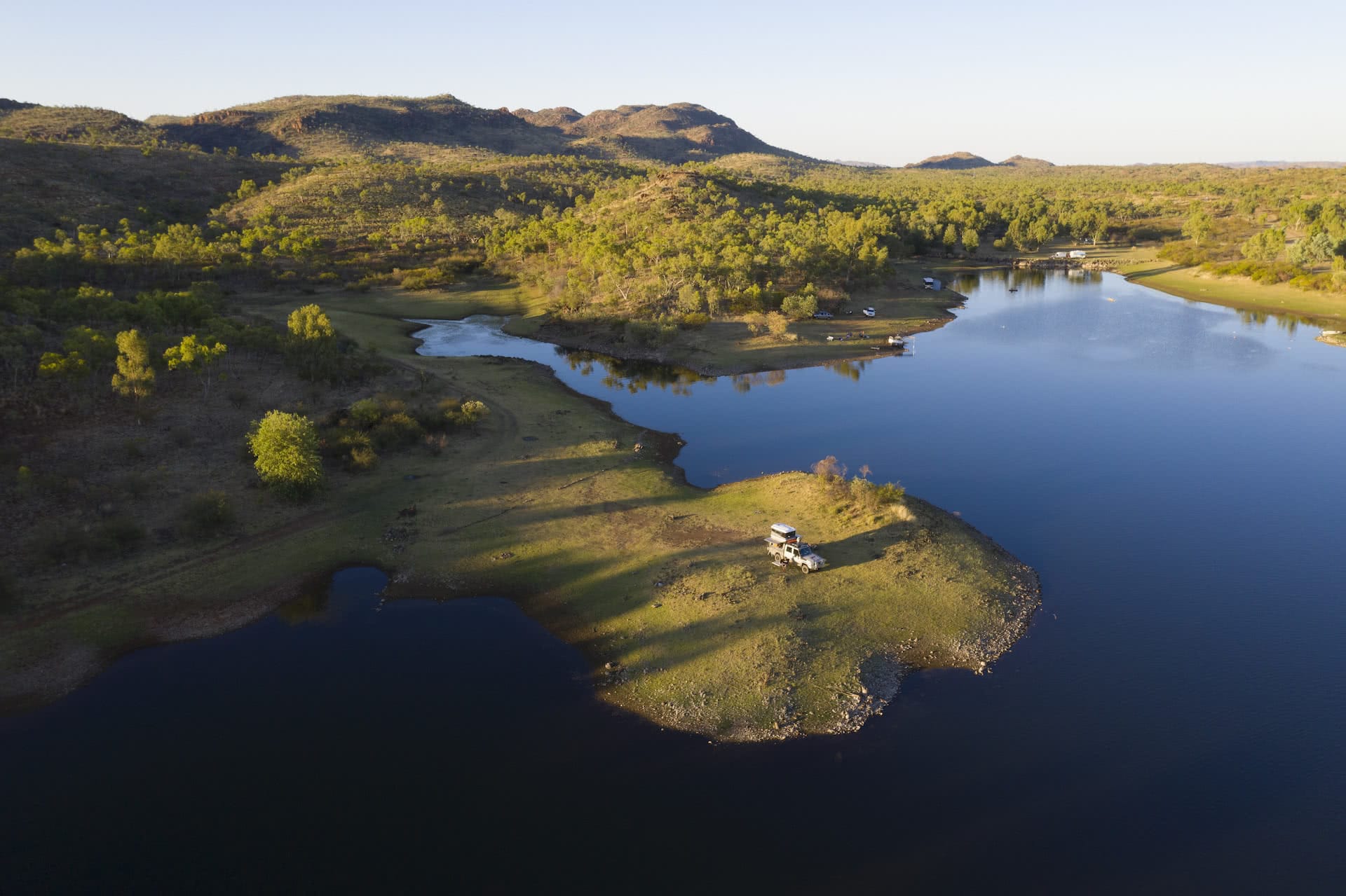 Top 10 Road Trips in Queensland, photo from TEQ, drone shot, lake, car, camping, mountains