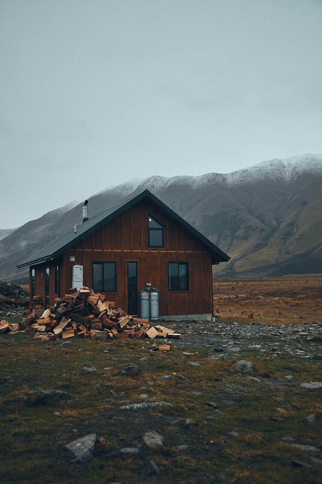 This High Country Cabin Offers the Wild Isolation We All Need Right Now, photo by Kenny Smith, cabin, isolation, twizel, south island, new zealand, firewood