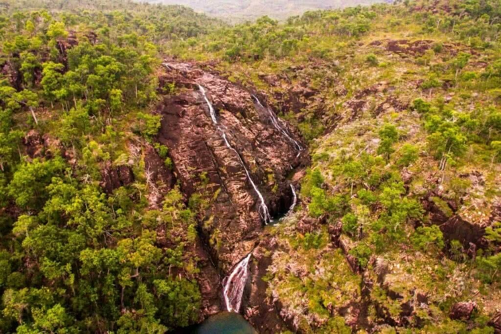 The Thorsborne Trails Offers 4 Days of Tropical Island Trekking, Andrew Boyle, Hinchinbrook Island, Zoe Falls, drone shot, waterfall, forest
