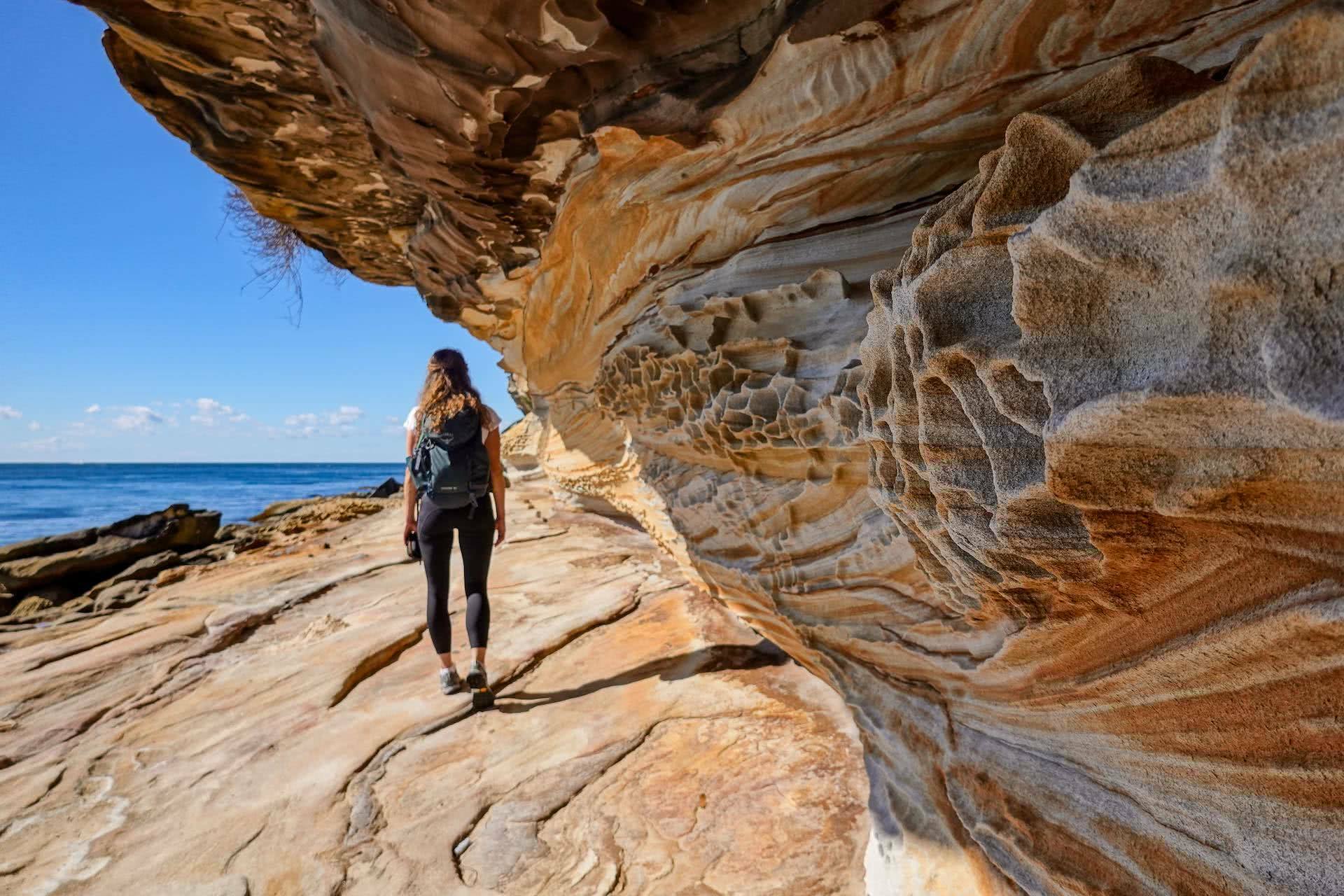 Conquer The Cronulla to Kurnell Coast Walk in One Day, Dan Piggott, woman, rock formation, cliff