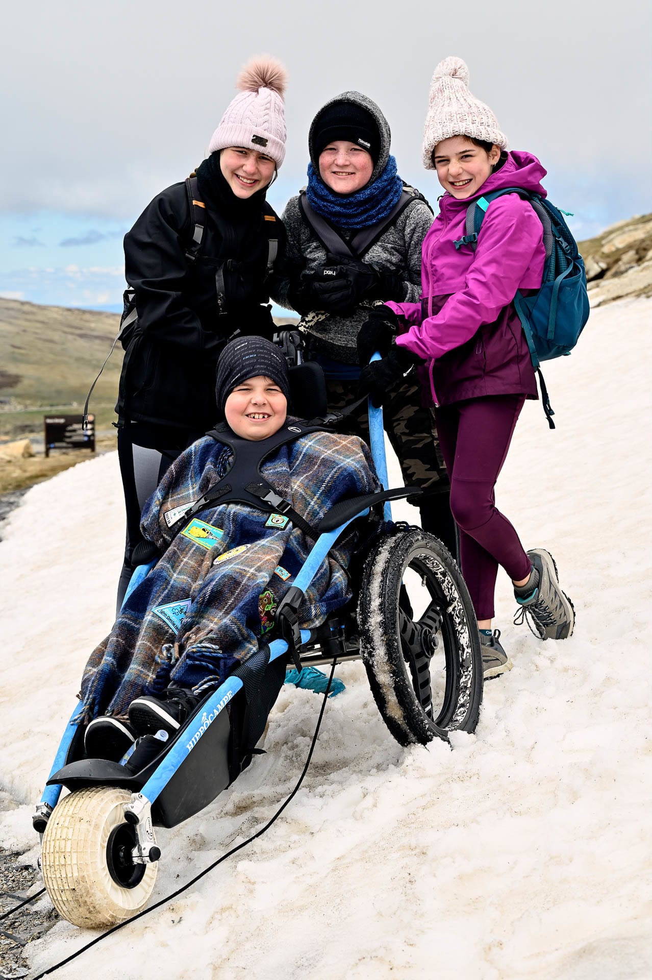 Josh, his sister and cousins the novelty of a play in the snow, 4 Ideas for Accessible Adventures in NSW, joe kennedy, kosciuszko national park, summit track