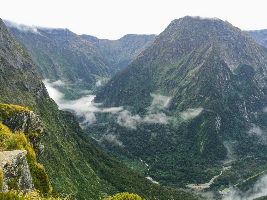 How To Squeeze Three of New Zealand’s ‘Great Walks’ Into Under Two Weeks, Bree Townsend, Milford Track, MacKinnon Pass, mountain, valley, cloud