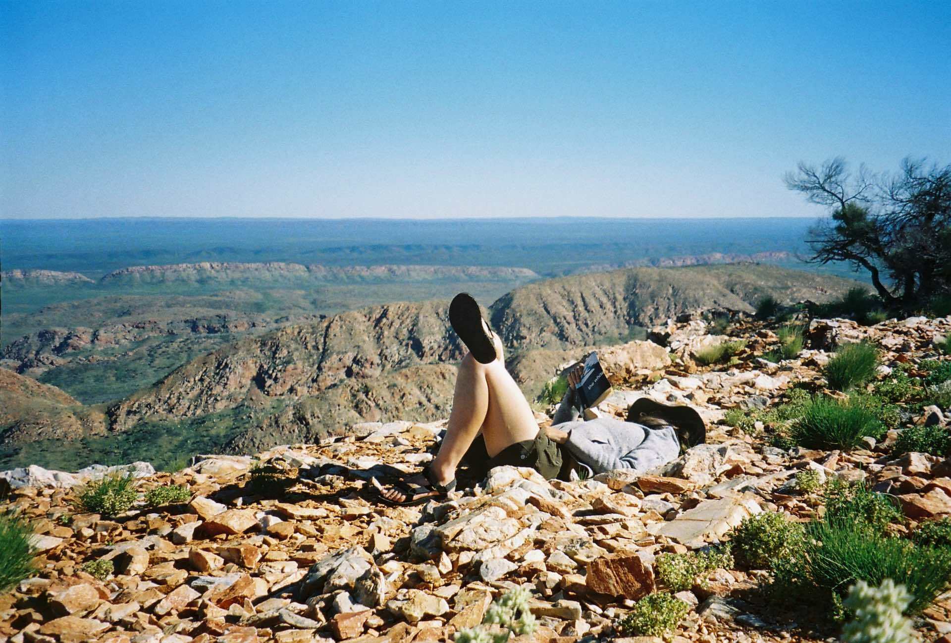 10 Things You Need to Know Before Hiking The Larapinta Trail, Ruby Claire, Central Australia, sleep, nap, read, rest, woman, tevas, read, mountains, desert