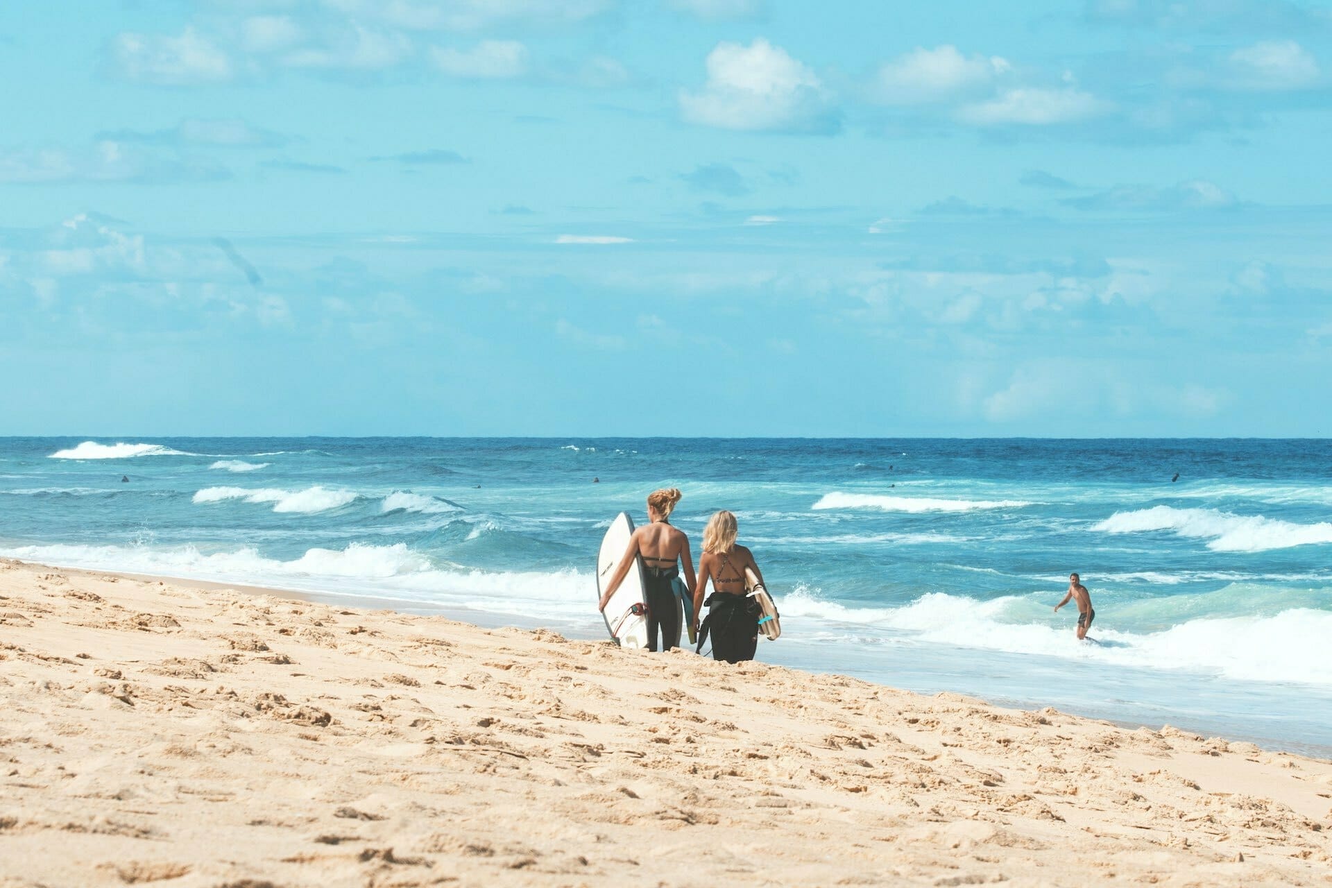 Who’s a Ski Instructor Supposed to Date When They’re Not in The Mountains?, Photo by Marvin Meyer. Beach, surfinng, girls. 