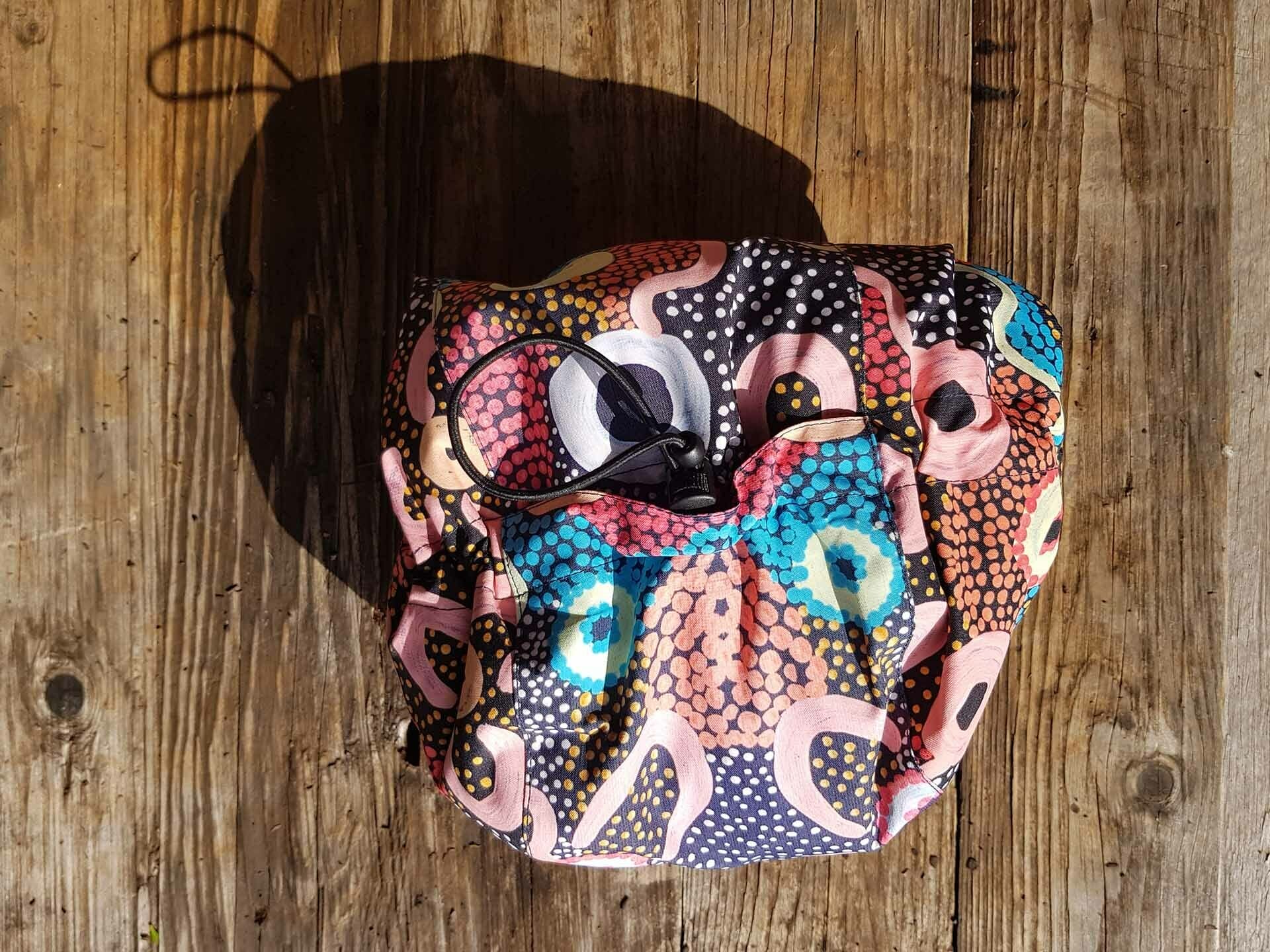 Team Timbuktu Banksia Forest Elements Waterproof Jacket – Gear Review_Sian Brain, rain jacket, indigenous artwork, first nations, sunshine, raincoat, waterproof, art, pattern, colourful gear