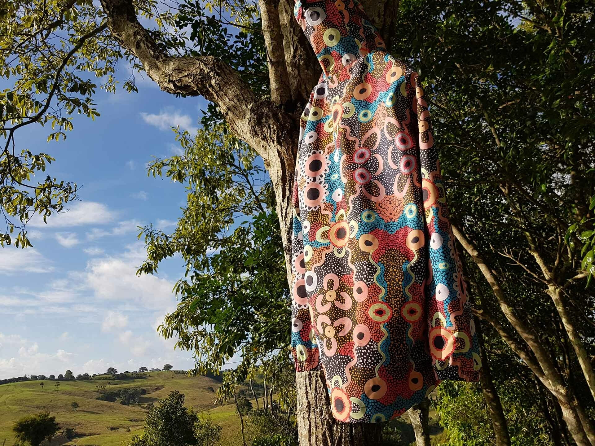 Team Timbuktu Banksia Forest Elements Waterproof Jacket – Gear Review_Sian Brain, rain jacket, indigenous artwork, sunshine, raincoat, waterproof, art, pattern, colourful gear