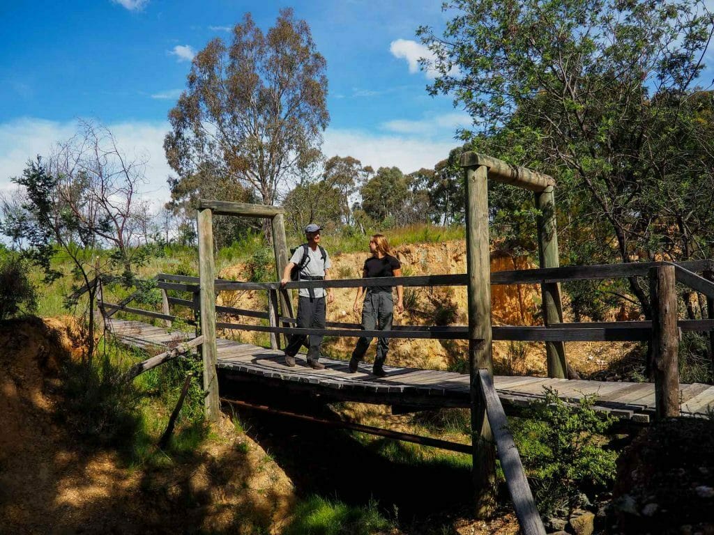 Hartley to Hill End – A Road Trip Through Rural NSW and Into History, Ruby Woodruff, Bald Hill Walking Track, Hill End, bridge, couple, hike