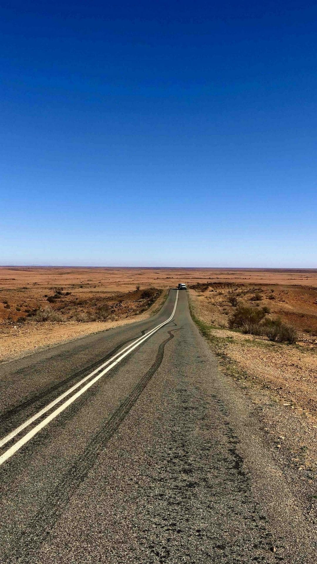 The Tiny Towns of Outback NSW, Iesha McRae, Mundi Mundi lookout, plains, road, outback