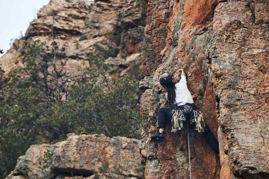 The Communities Brought Together by Climbing - A Day with Riley from ClimbingQTs, pat corden, climbing, person, rockface
