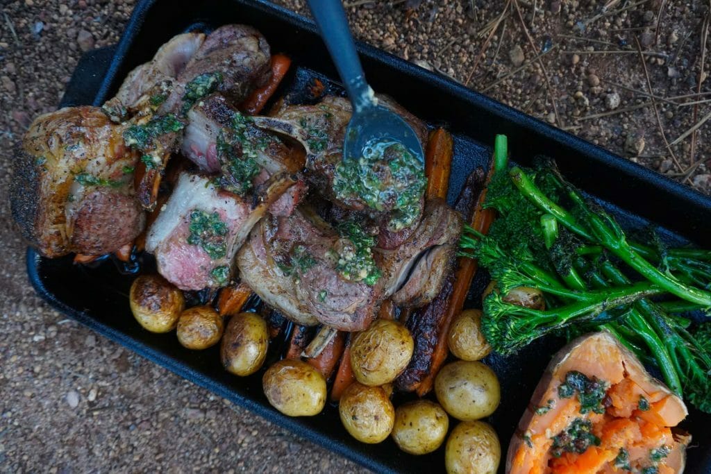 How To Cook The Ultimate Campfire Roast, Photo by Vanessa Hidayat, recipe, camping recipe, camp food, outdoor food, tray of roasted meet and vegetables