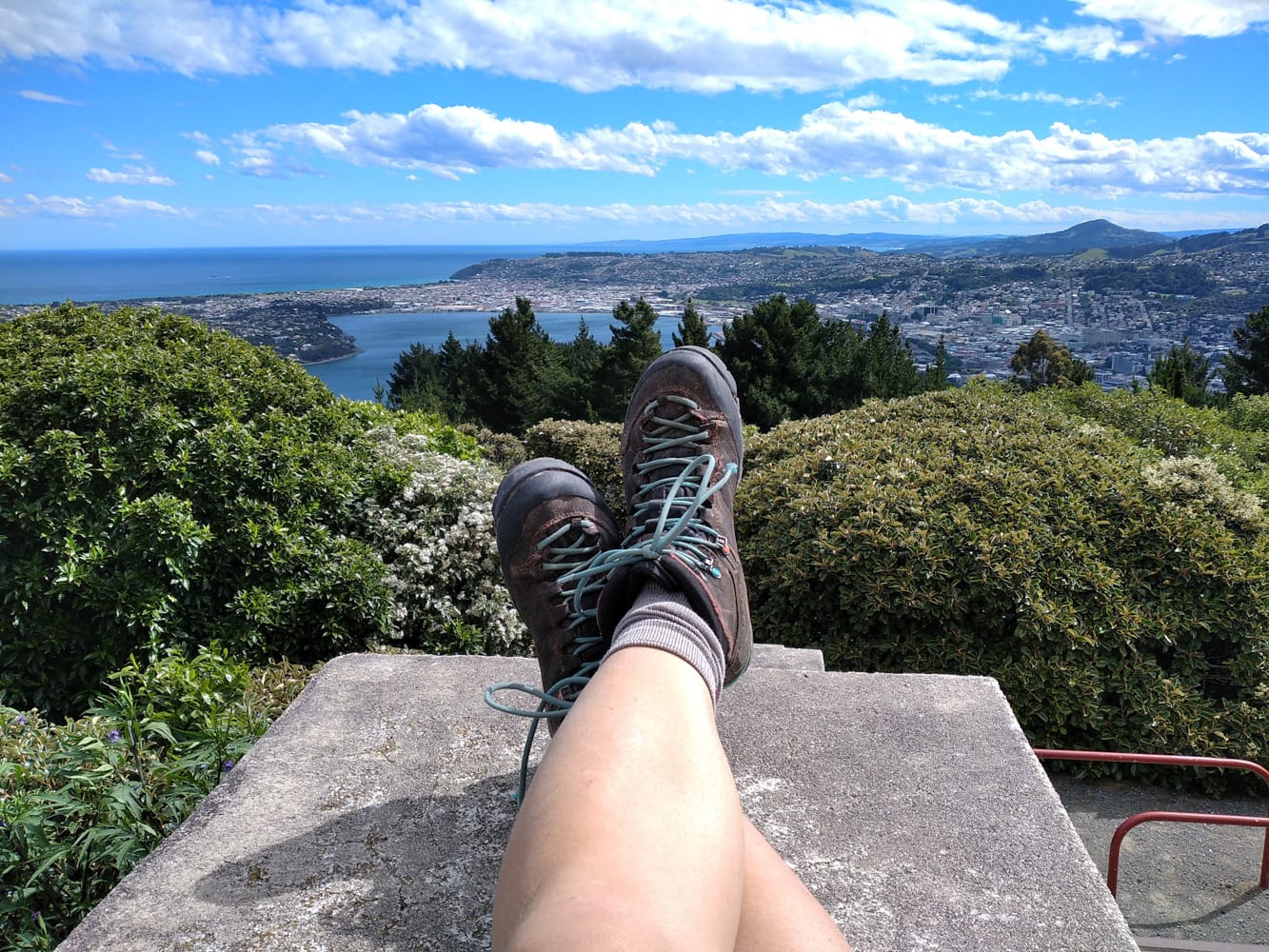Dunedin is an Unsuspecting Adventure City on NZ’s South Island, Myrthe Braam, mountaintop, shoes, view