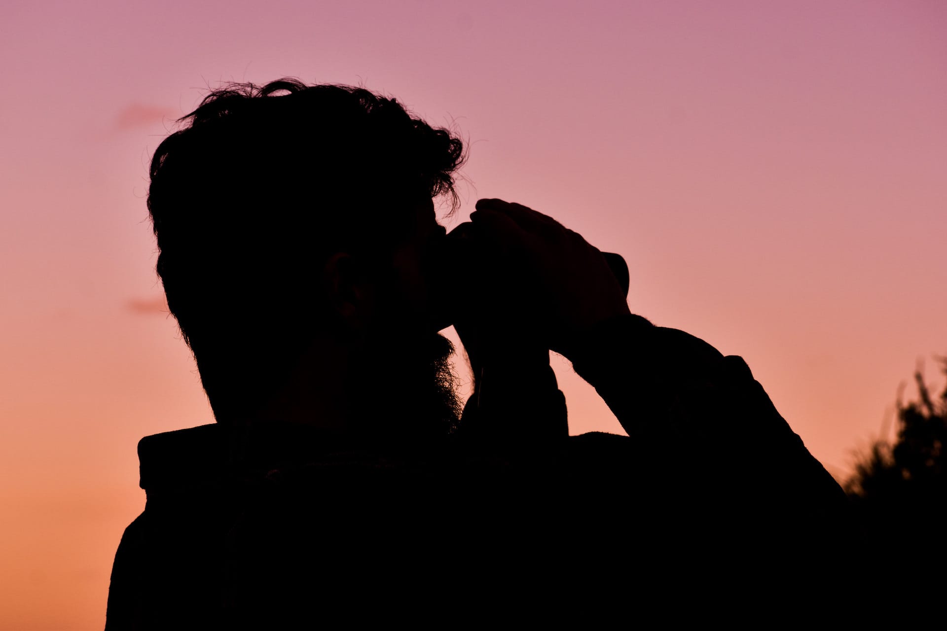 How To Tell if You're a Bird Nerd, Eva Davis-Boermans, man, sunrise, silhouette, binoculars, birdwatching