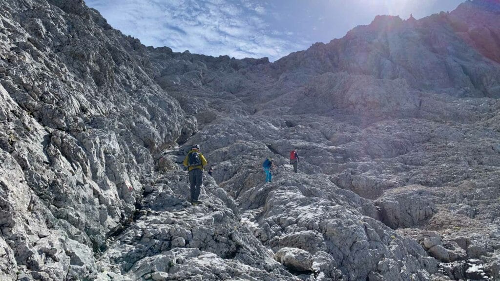 Hiking Above Germany’s Melting Glaciers During Europe’s Record-Breaking Summer, Wendy Bruere, 2022,rocks, people, mountain