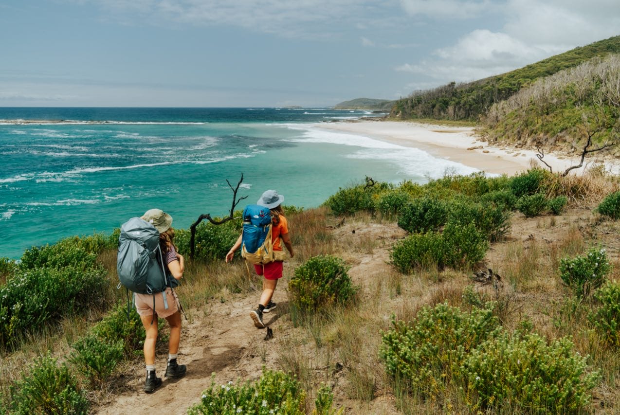 The New 3 Day Hike on NSW’s South Coast is Now Open for Bookings, photo by R Brand of DPE, Pretty Beach, women, couple, hiking