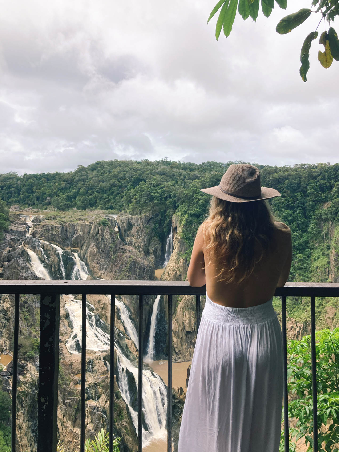 A Guide to the Rainforest Village of Kuranda, Delila Bevan-Zedanksy, person looking at waterfall