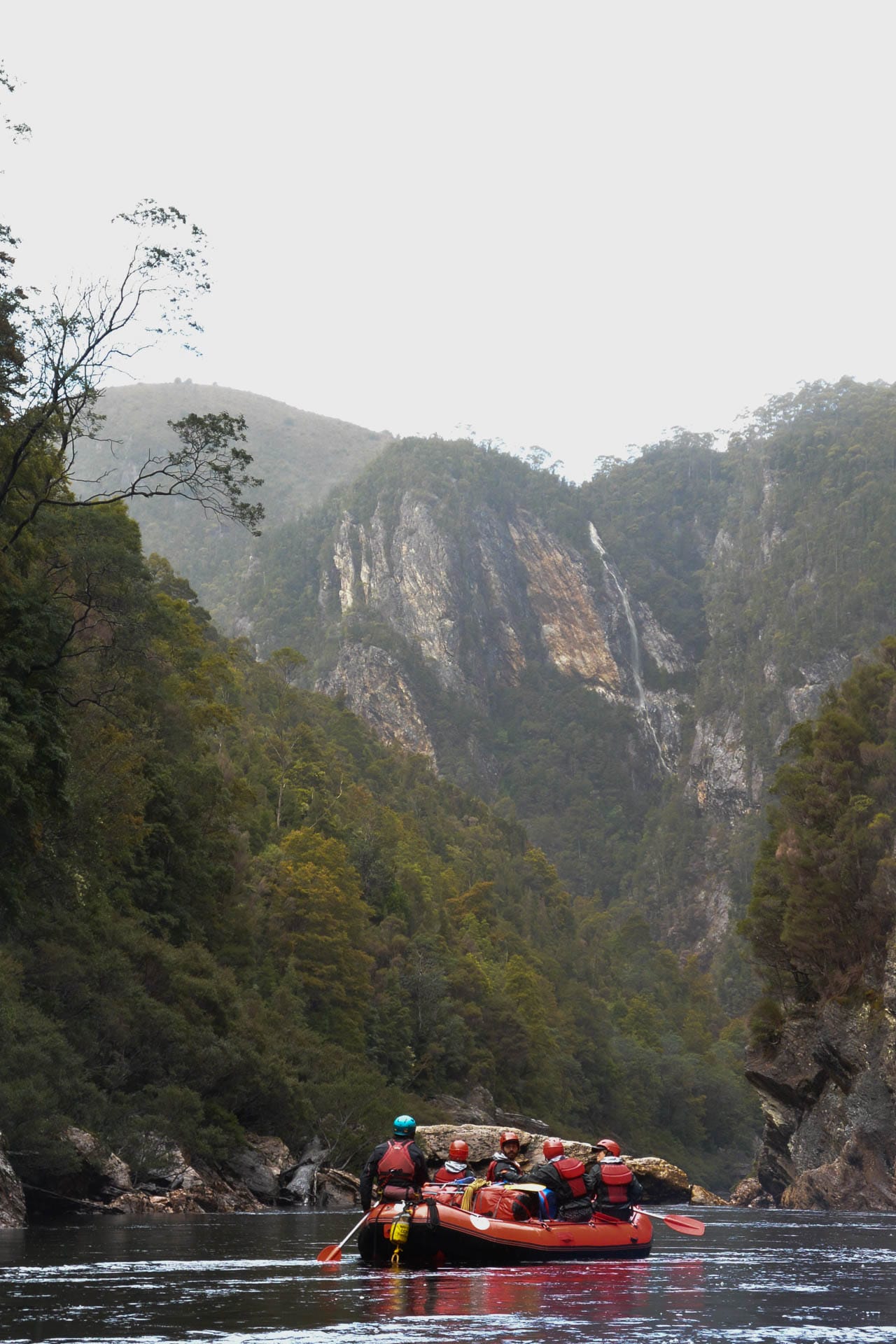 Rafting the Franklin: An Exercise of Forgetting Expectations and Embracing Reality, Kirsty Imms, mountains, the franklin river, mist on the mountains