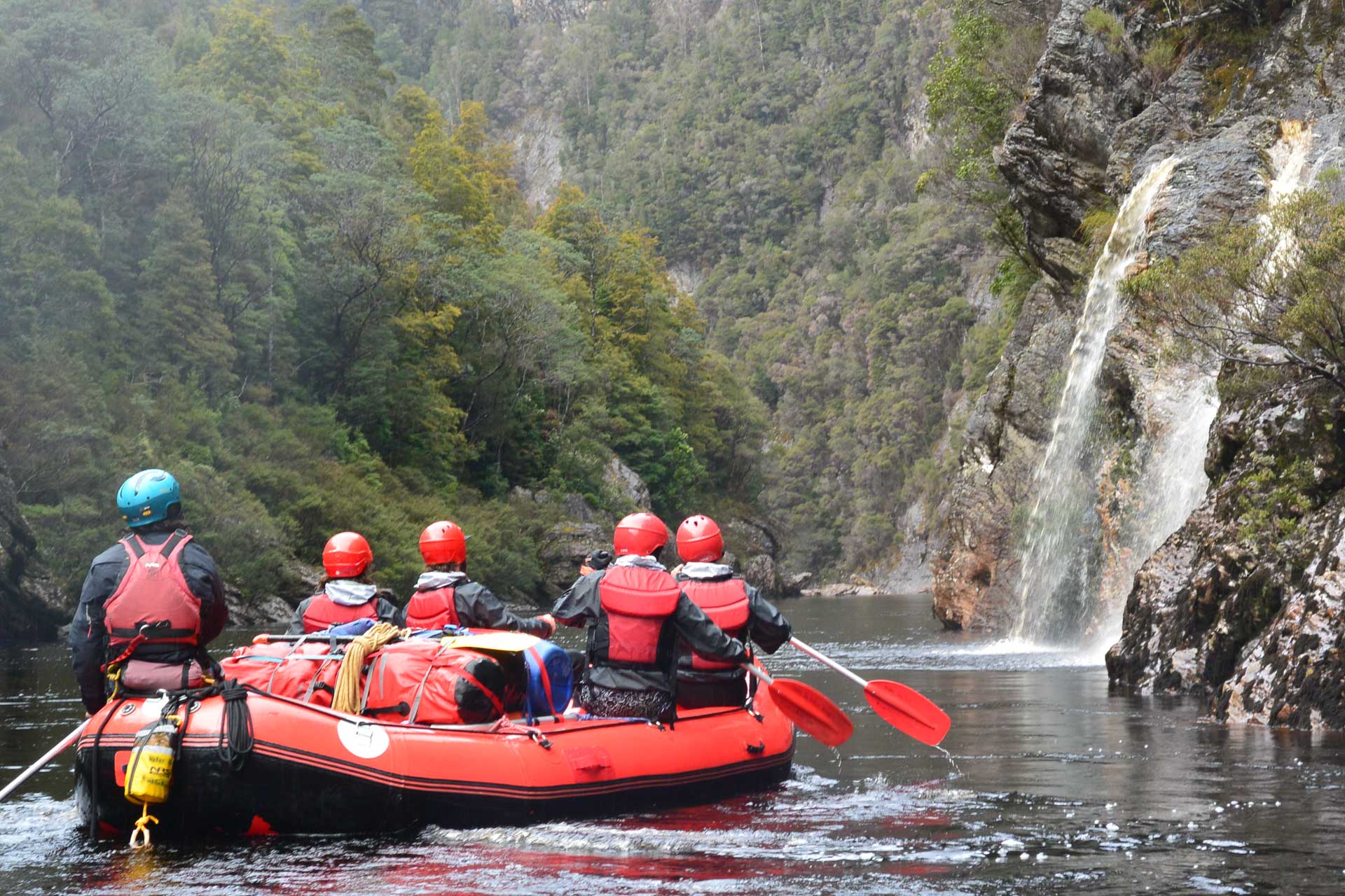 Rafting the Franklin: An Exercise of Forgetting Expectations and Embracing Reality, Kirsty Imms, people on a raft on the franklin river