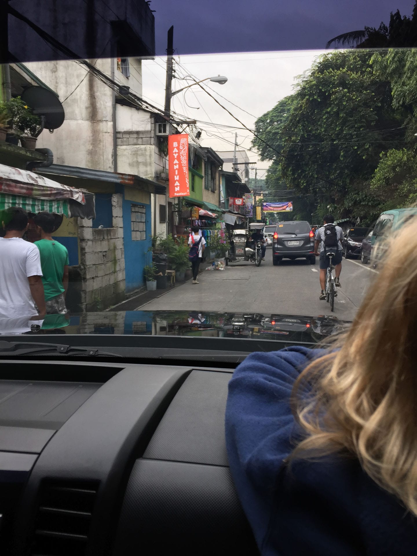 How Being an Expat Changed my Perspective on Adventure, Sarah Schmitt, streets, philippines, looking out from car