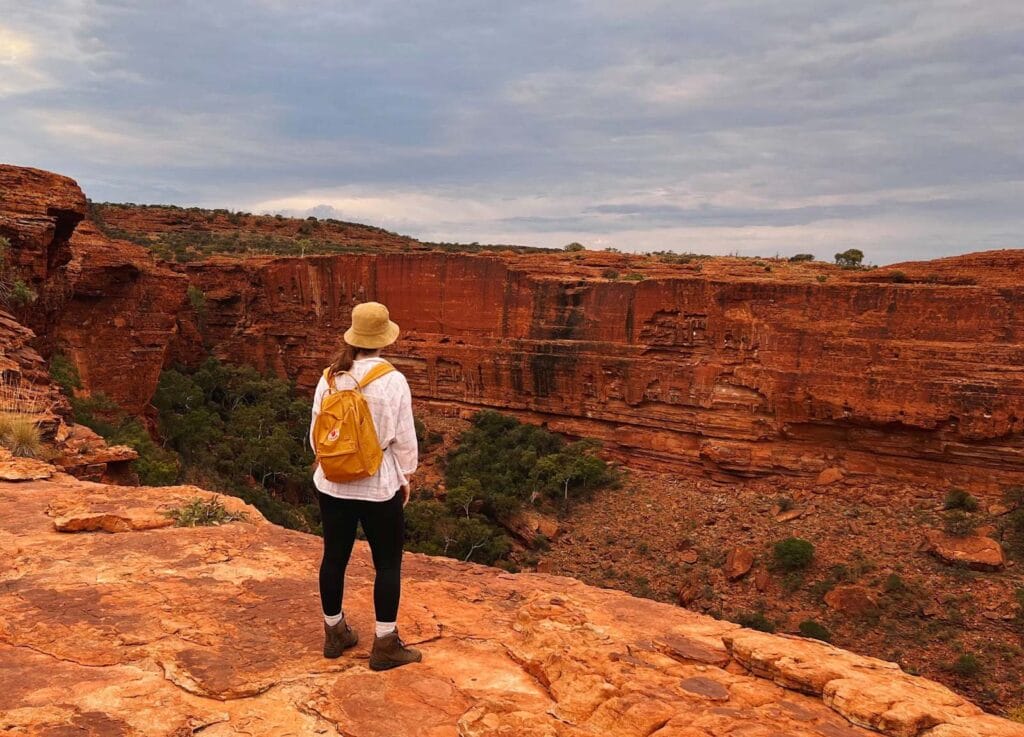 Lights, Canyon, Action: Experiencing The Red Centre’s Newest Immersive Art Installation, ally burnie, hiker in kings canyon, rock formation, desert