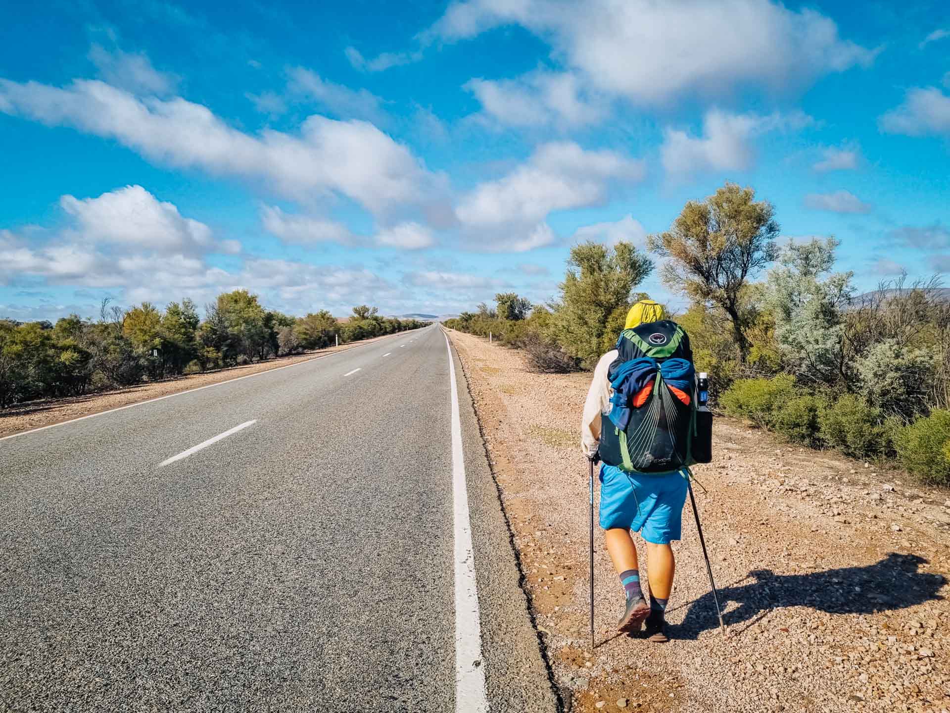 13 Unexpected Things I Learnt About Thru-Hiking (While on the 1200km Heysen Trail), Elisha Donkin, hiker walking on the side of road