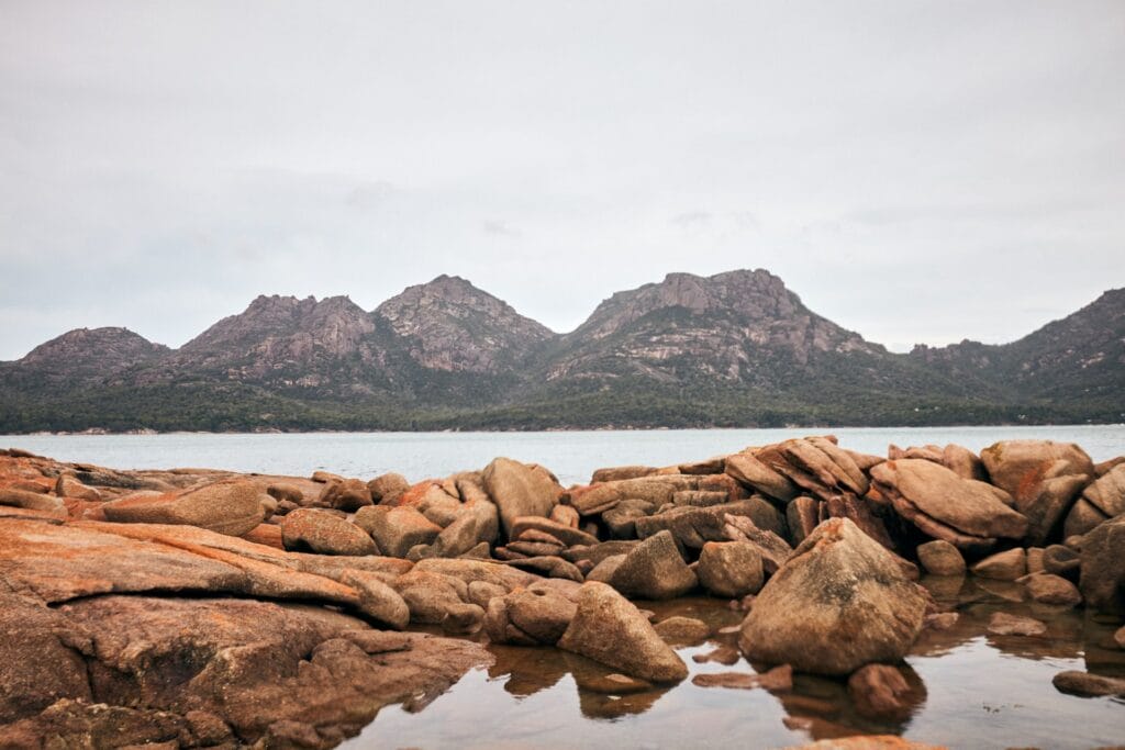 Paddle the Freycinet Peninsula – A Guide to Kayaking This Spectacular Tassie Coastline, Remi Chauvin, ocean, coast, rocks