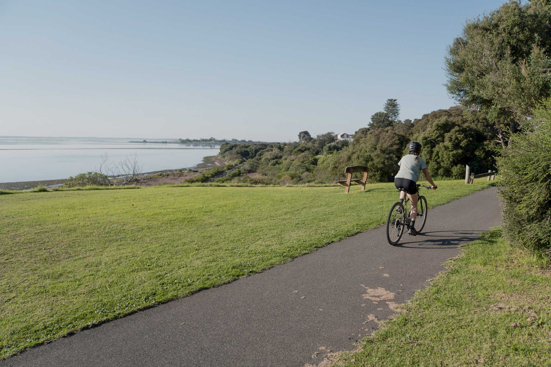 Bellarine Rail Trail – Explore Victoria’s Farmland and Coast on This 35km Cycling Track, Alyson Lamb, person riding a bike on a cycle path