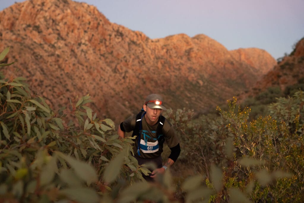 Did You Know You Can Trail Run in the Red Centre?, Jayden O'neill, trail runner in the west mac monster, running in red valley