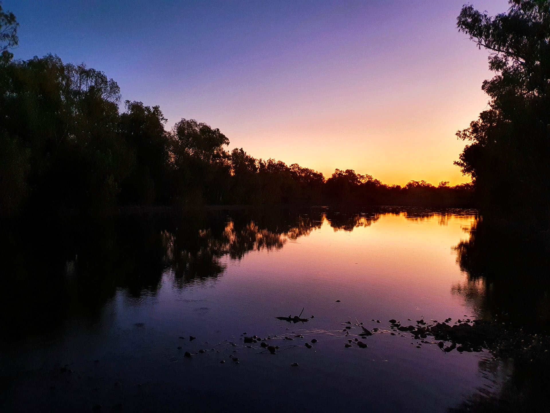 I Spent 10 Days Bikepacking the Duncan Road in East Kimberley, Cathy Young, creek, sunset