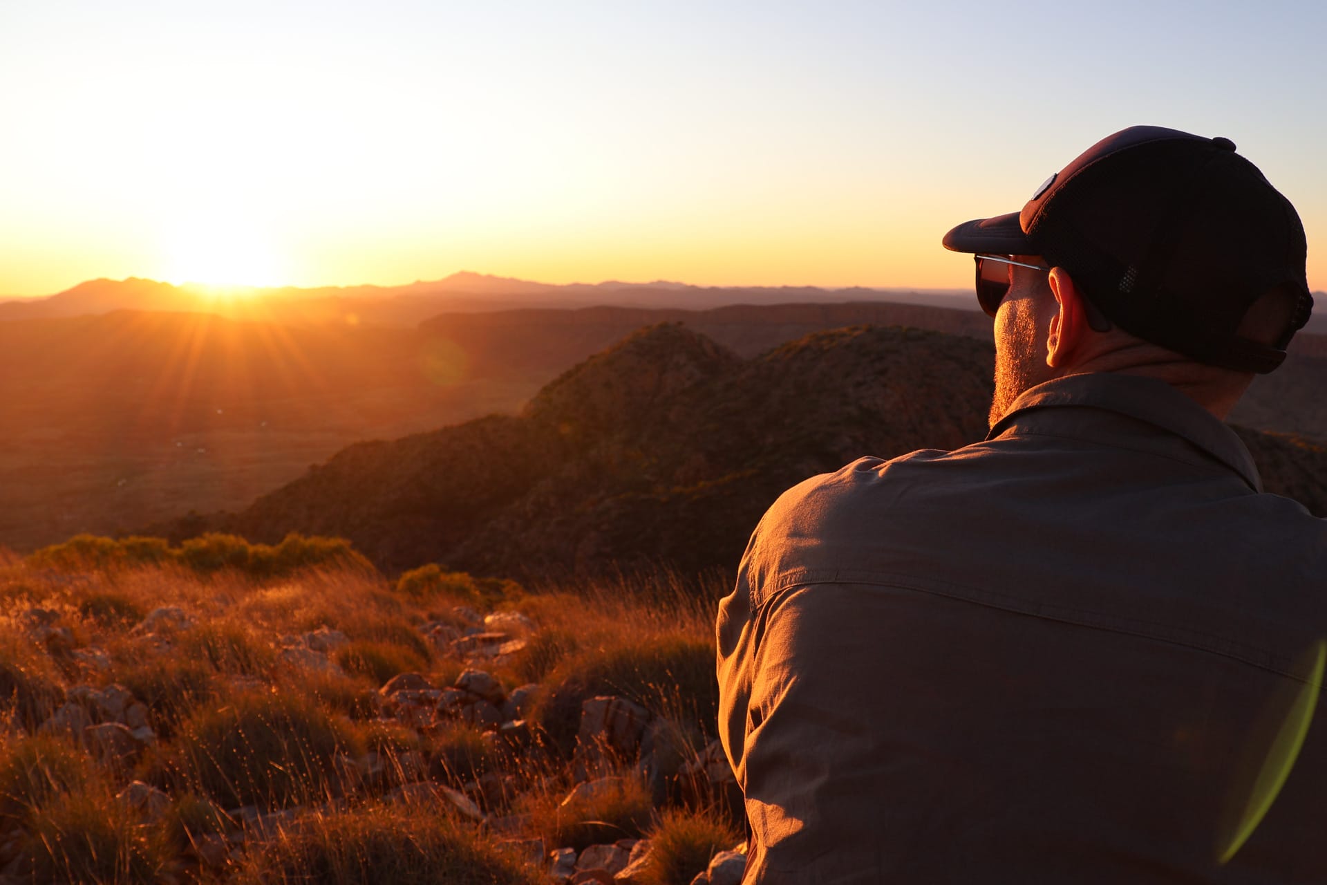 Mount Giles – The Rocky Path to the Best Views in the West MacDonnell Ranges, Eva Degel, person watching sunrise on mt giles