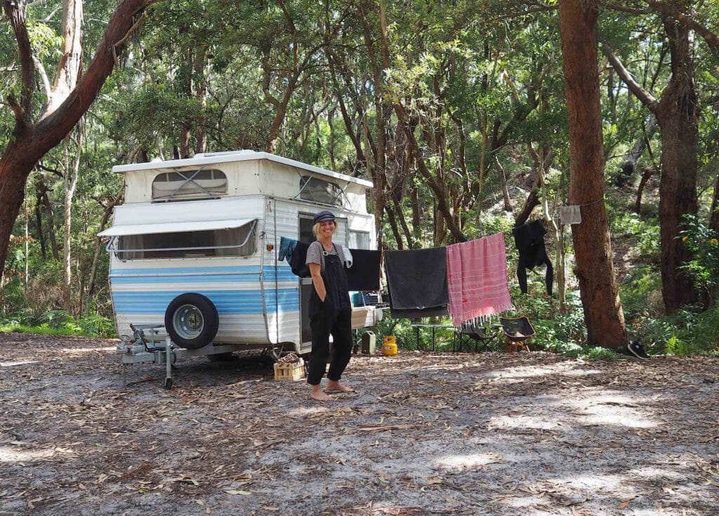 Why I Renovated and Live in a 43-Year-Old Caravan, Georgia Doherty, Yamba, NSW, Red Centre, NT, Caravan, external caravan, portrait, smiling, clothesline