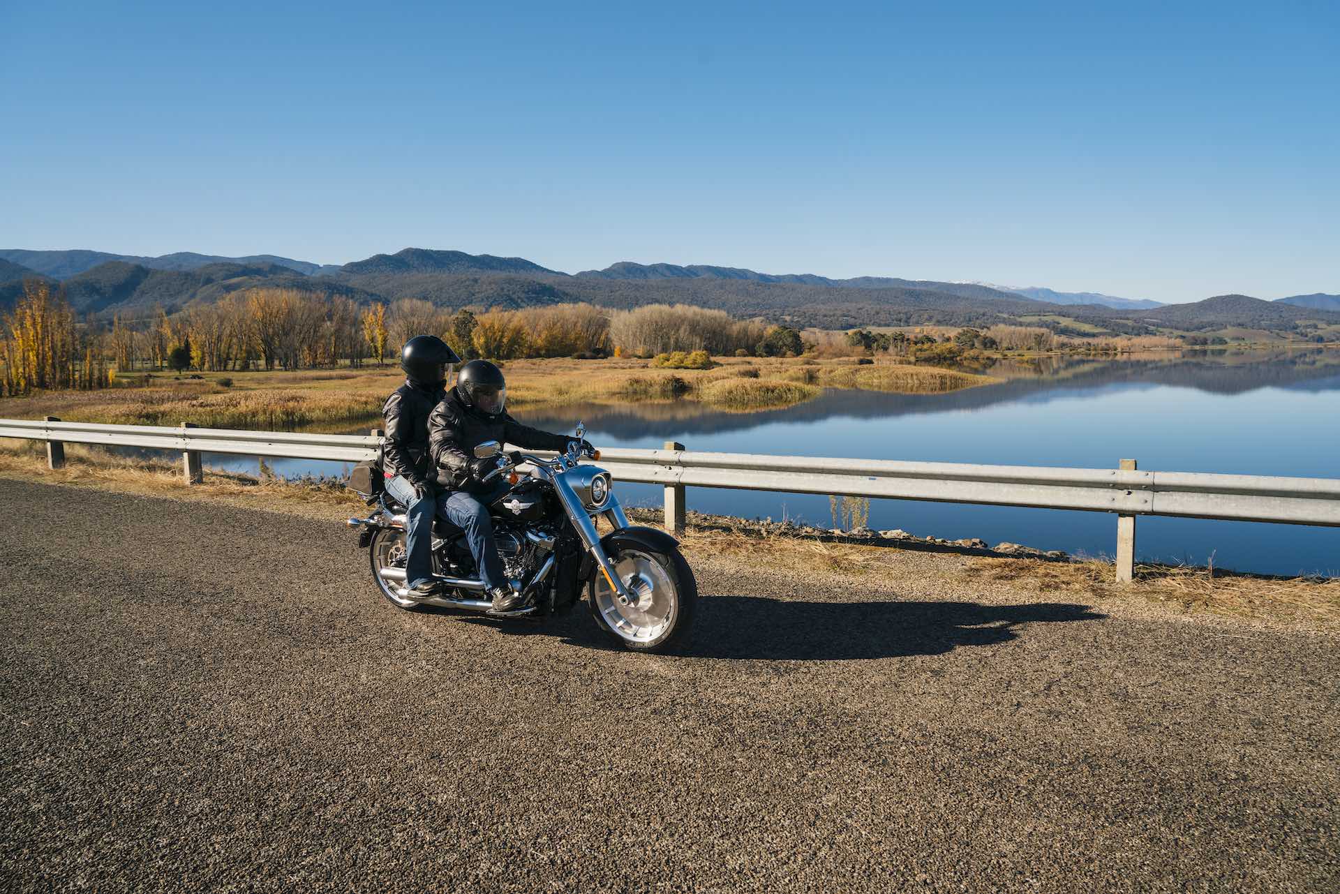 A comprehensive guide to motocamping, Adam Jones, motorcycle on bridge, Khancoban Pondage, Snowy Mountains, Credit: Snowy Valleys Council; Matt Beaver,