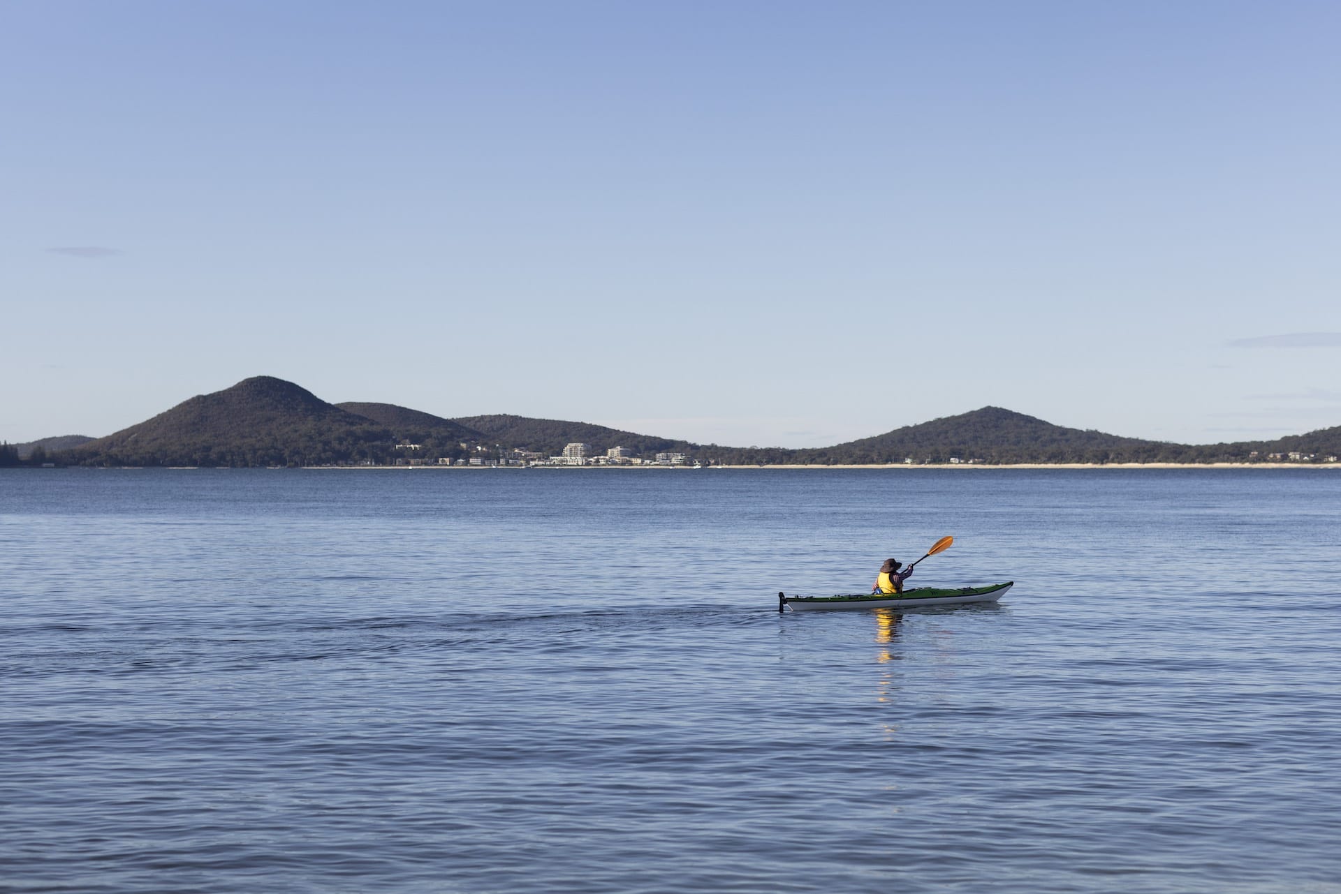 8 Lesser-Known Destinations in NSW and Why You Need To Visit Them, Eva Davis-Boermans, ocean, kayaking, kayaker, Jimmys Beach, NSW, Image Credit: Reflections Holiday Park
