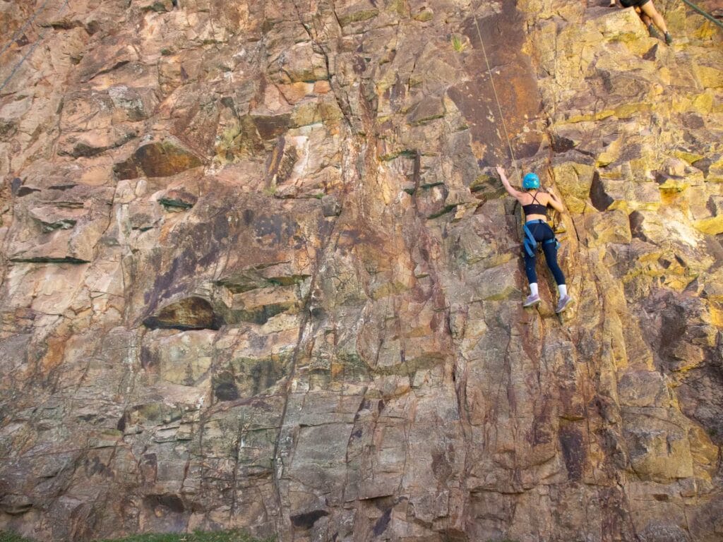 Getting Into Adventure When You Have No Gear, No Idea, and No Friends (Well, Adventurous Ones), Constance Allen, Kangaroo Point, Queensland, girl climbing, rock climbing, cliff face, ropes, Adrenaline Sponsored