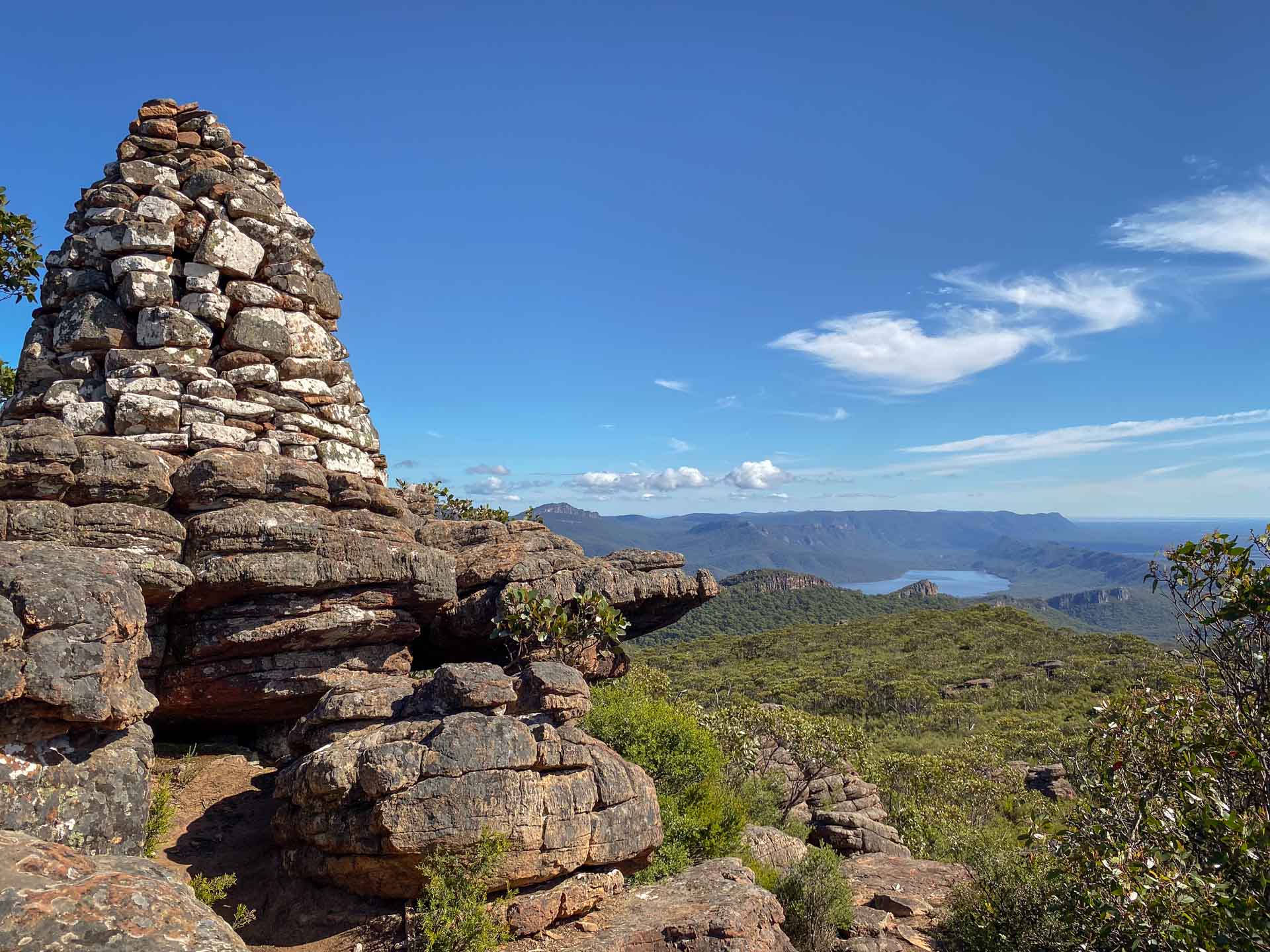 Major Mitchell Plateau – Hike the Best of the Grampians Over 3 Days, Hiking, Multi-Day Hike, Victoria, stack of rocks with mountain range in background