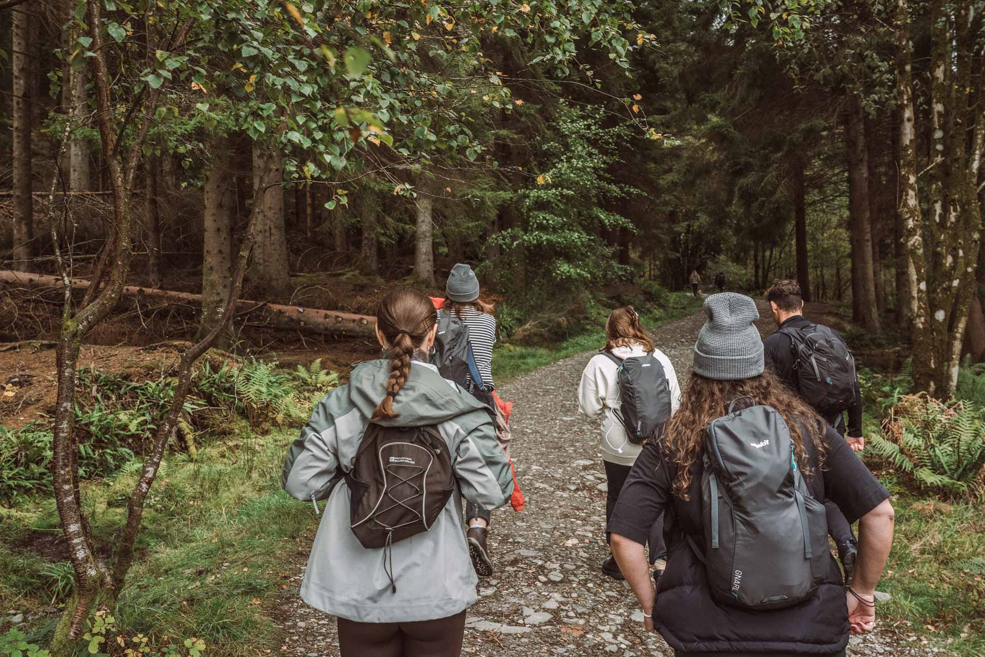 Loch Lomond: Where The Highlands Meet The Lowlands, scotland, scotland hiking, lochs of scotland, loch lomond, group of people hiking in the forests of scotland