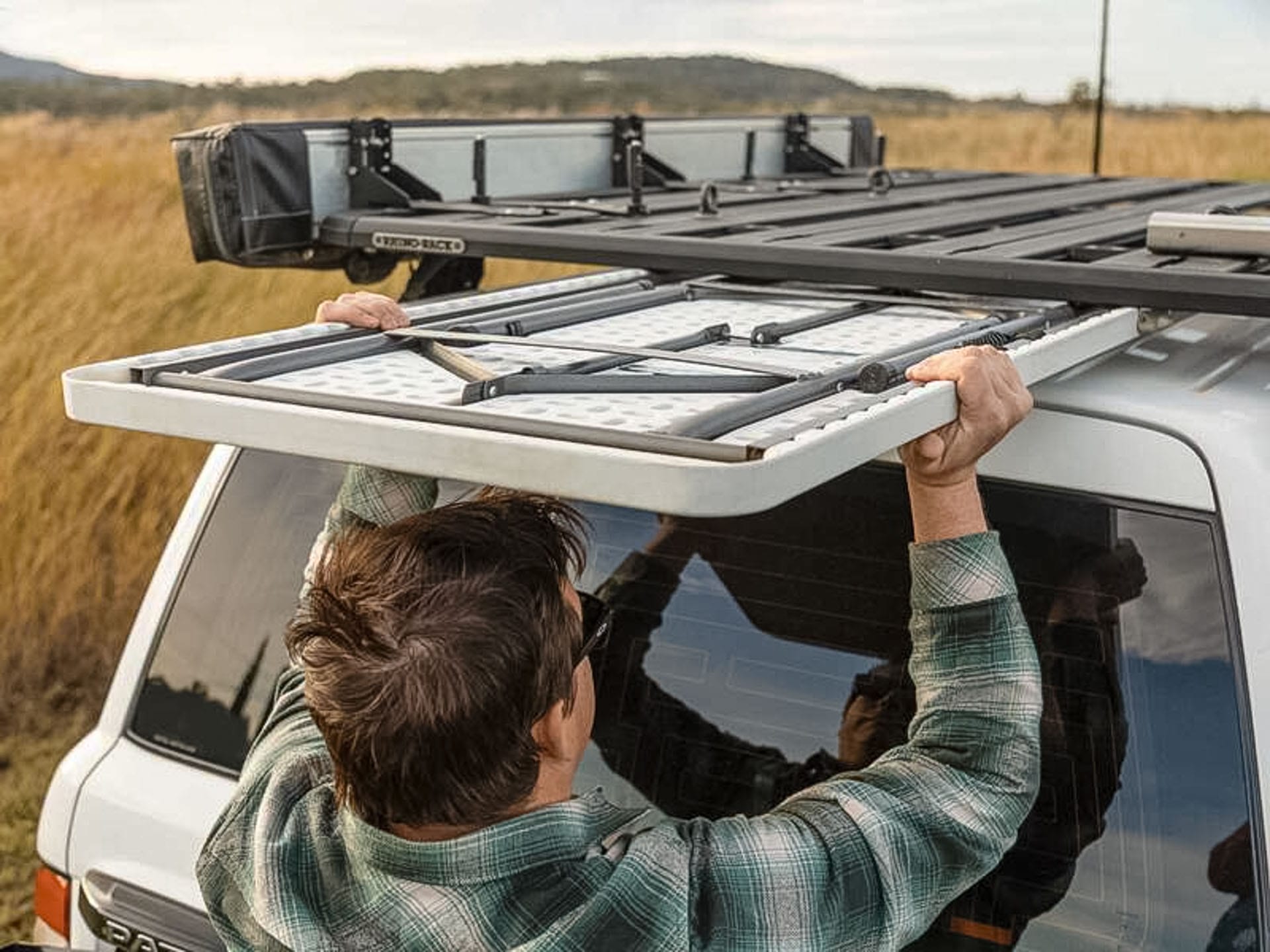 10 Nifty 4WD Storage Solutions You Probably Haven't Thought Of, koan, sponsored, roof rack table slide