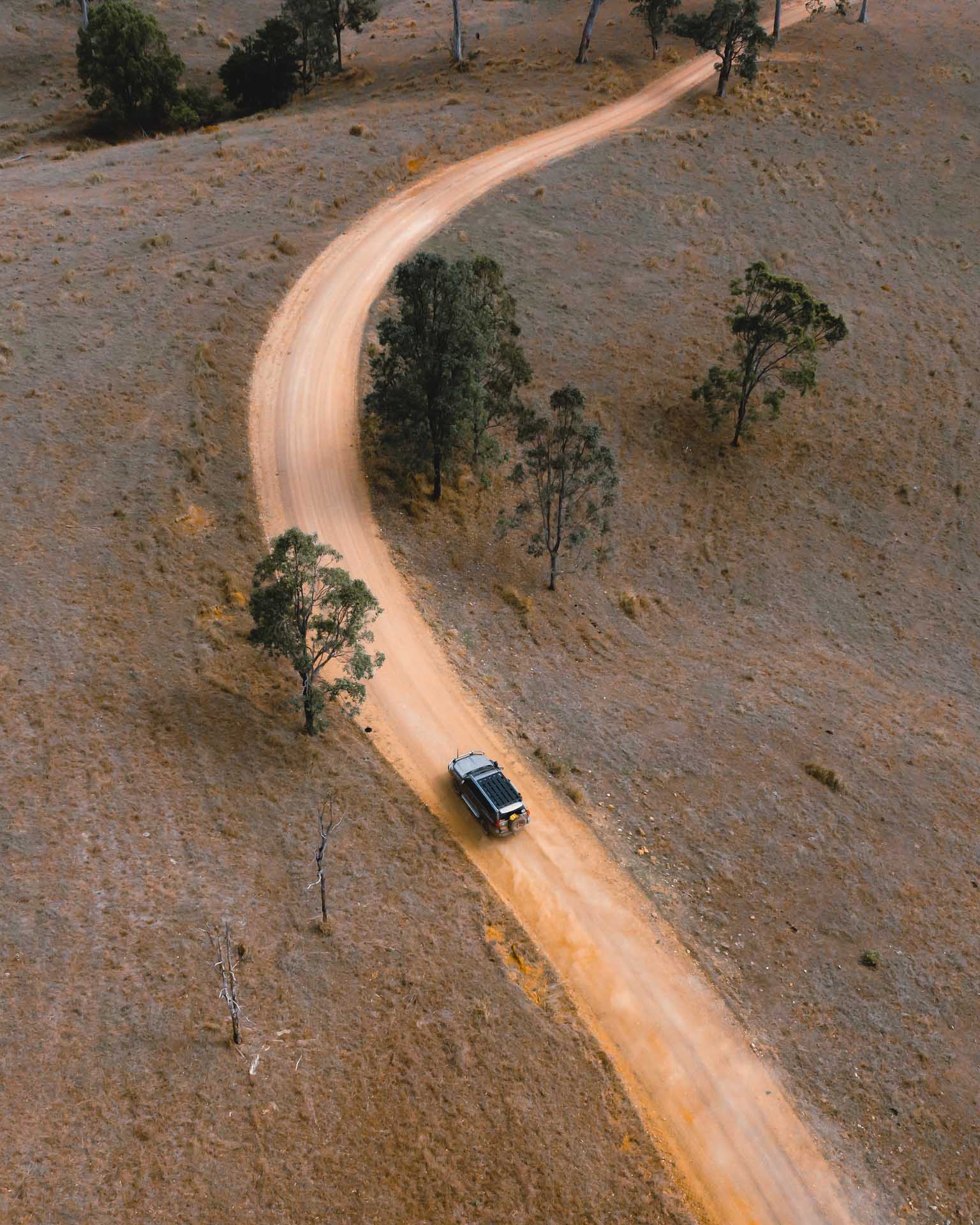 I Never Thought I’d Become a 4WD Guy, kaon, sponsored, drone shot of a 4wd driving on a remote dirt road