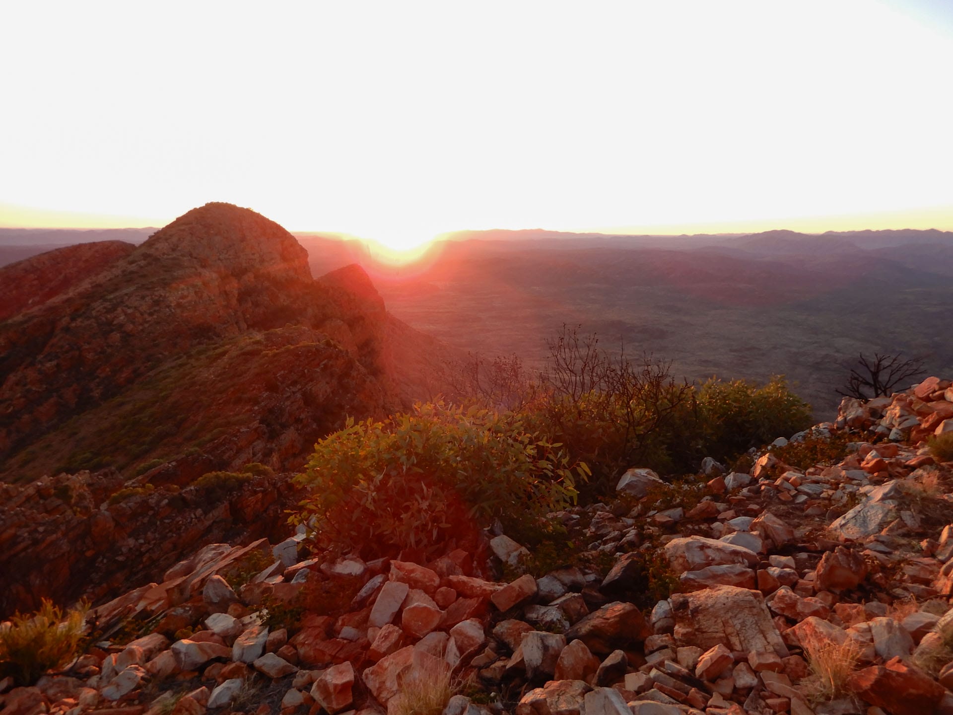 The ‘Big 3’ Hikes of the NT: How Do They Compare?, hiking, northern territory, larapinta trail, mountains, indigenous culture, multi-day hike, sun setting over the mountains in the larapinta trail