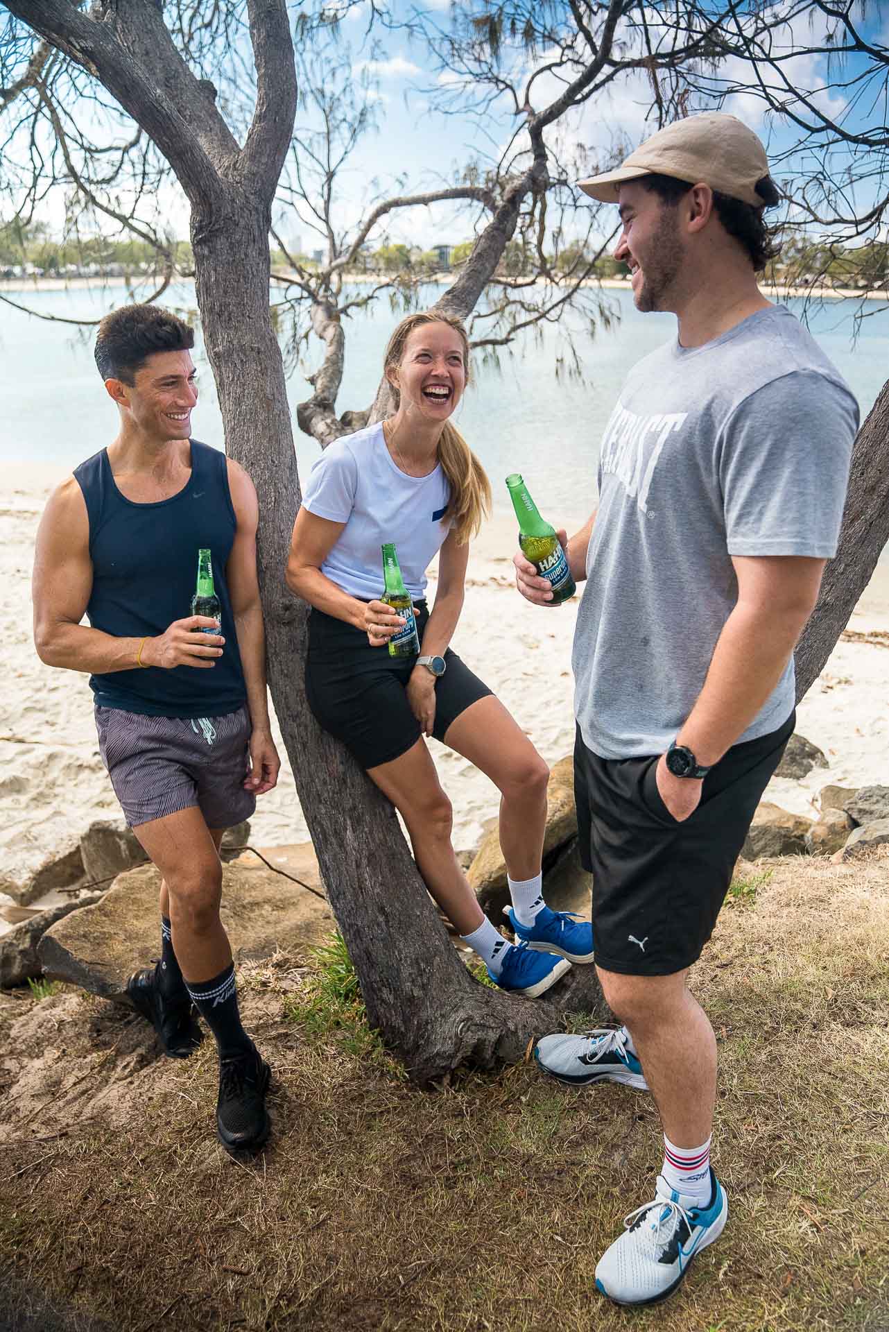 7 Simple Tips To Get Into Summer Running with Erchana Murray-Bartlett, trail running, running tips, running, erchana murray-bartlett and friends drinking hans beers by the sea
