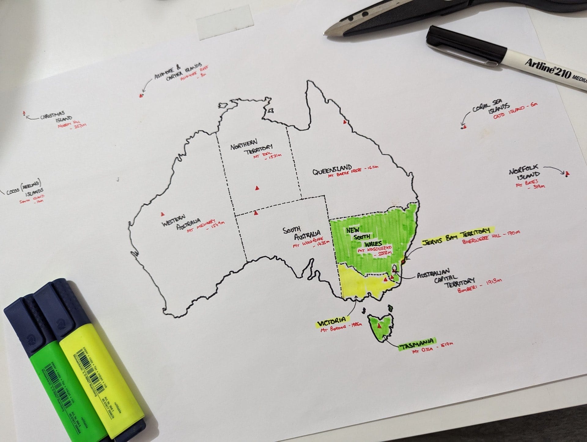 This Guy is Summiting the Highest Point in All 16 of Australia's States & Territories, william crompton, hiking, australian mountains, map of australia with highlighted areas to hike in green and yellow