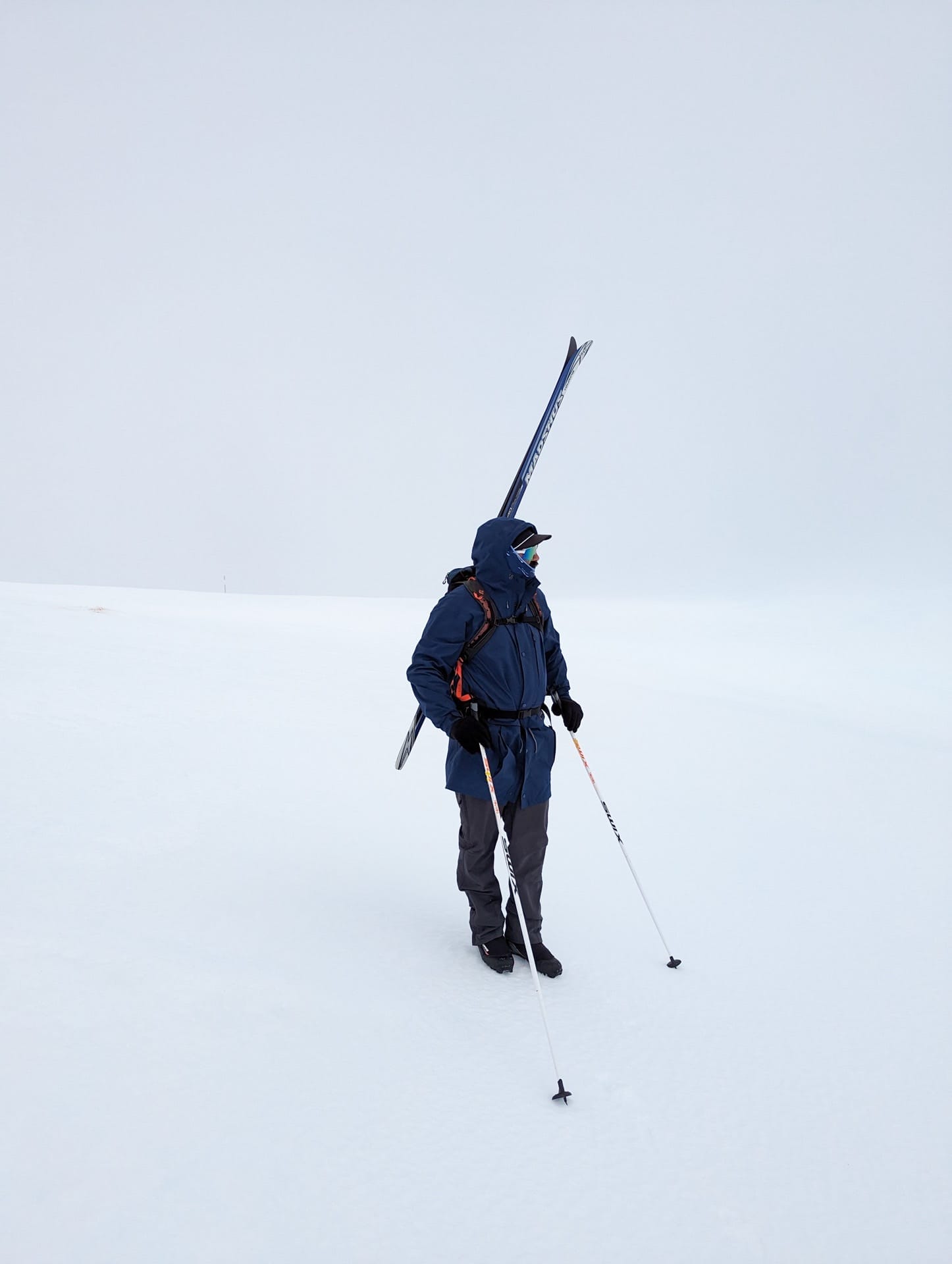 This Guy is Summiting the Highest Point in All 16 of Australia's States & Territories, william crompton, hiking, australian mountains, man hiking through snow at alice rawson pass