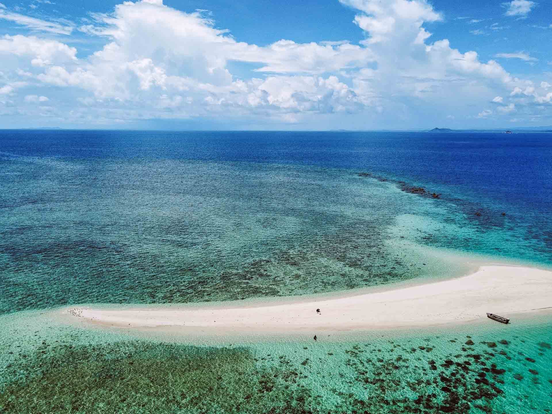 5 Ways We Made Our Cape York Trip That Much More Epic!, north queensland, queensland road trip, cape york, a sand cay in the ocean at cape york, tia bol