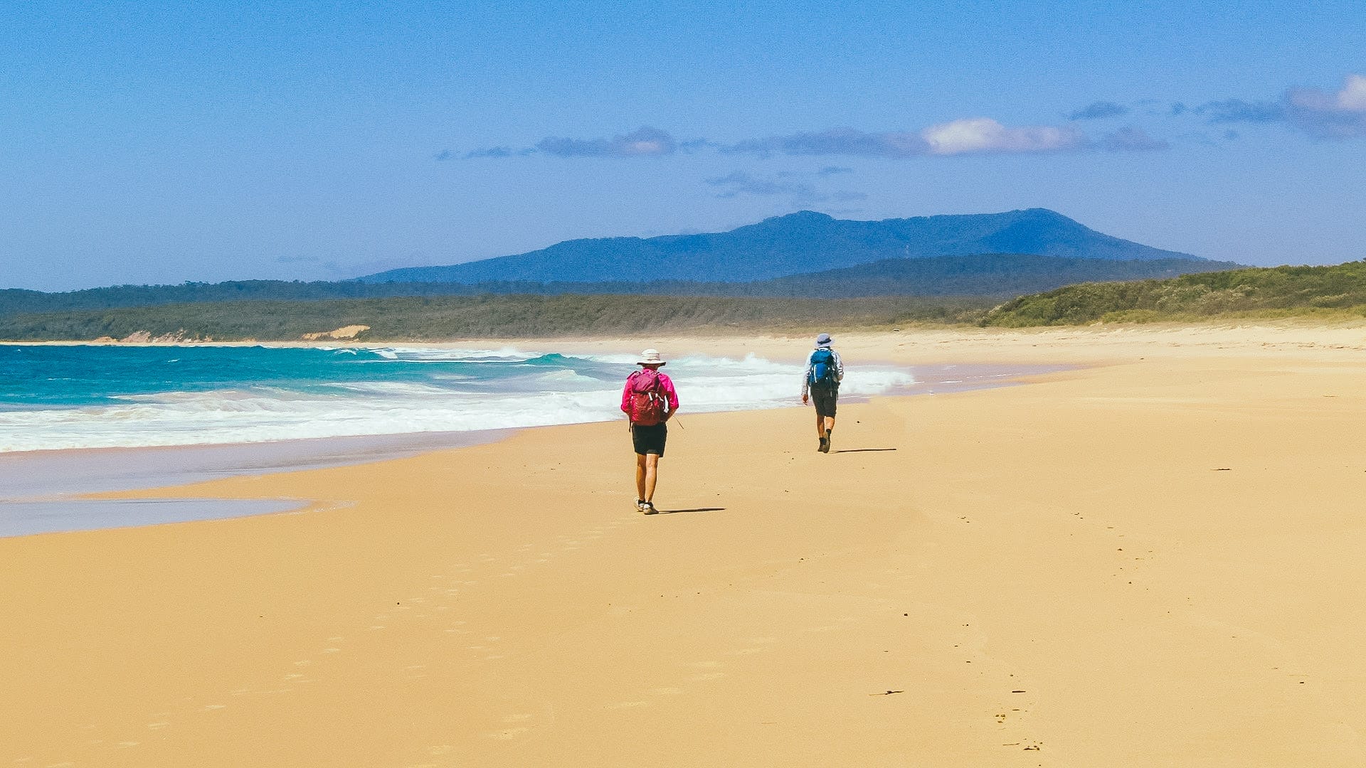 How My Wife & I Spent 20 Years Creating the Great South Coast Walk in NSW, Photo by David Briese, south coast NSW, beach hiking, multi-day hike, coastline, hikers walking along the beach