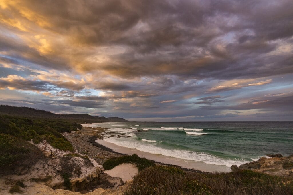 Camping The Friendly Beaches in Tasmania, Photo by Steven Penton on Flickr, Friendly Beaches, Rocks, wave, clouds, blue sky, sunrise