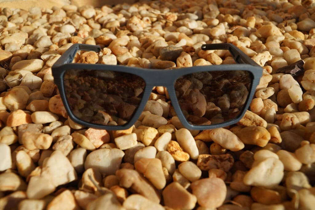 Costa Del Mar's Antille Polarised Sunglasses – Reviewed & Tested, costa del mar, Photo by Josh Fletcher, gear review, pair of antille sunglasses sitting on pebbles